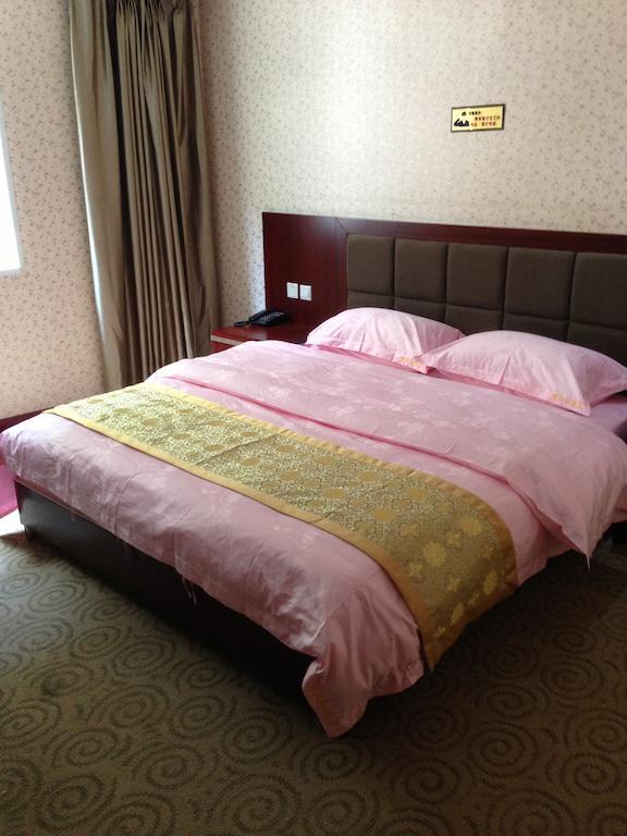 Jiuzhaigou Man Jiang Hong Hotel Quarto foto