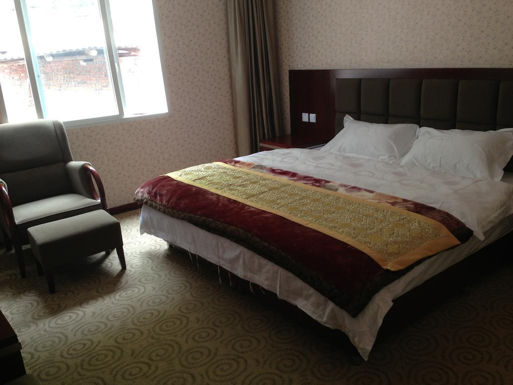 Jiuzhaigou Man Jiang Hong Hotel Quarto foto